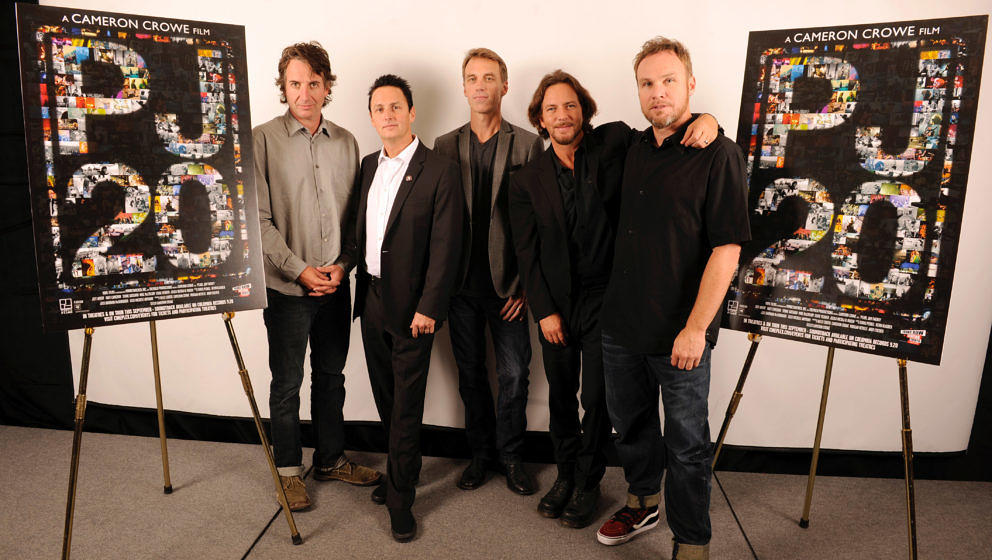 Stone Gossard, Mike McCready, Matt Cameron, Eddie Vedder and Jeff Ament of Pearl Jam pose after the 'Pearl Jam Twenty' press 