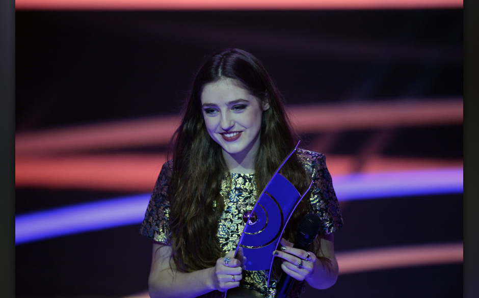 British singer Birdy celebrates with her award for Best Female artist Rock/Pop International during the 2014 Echo Music Award