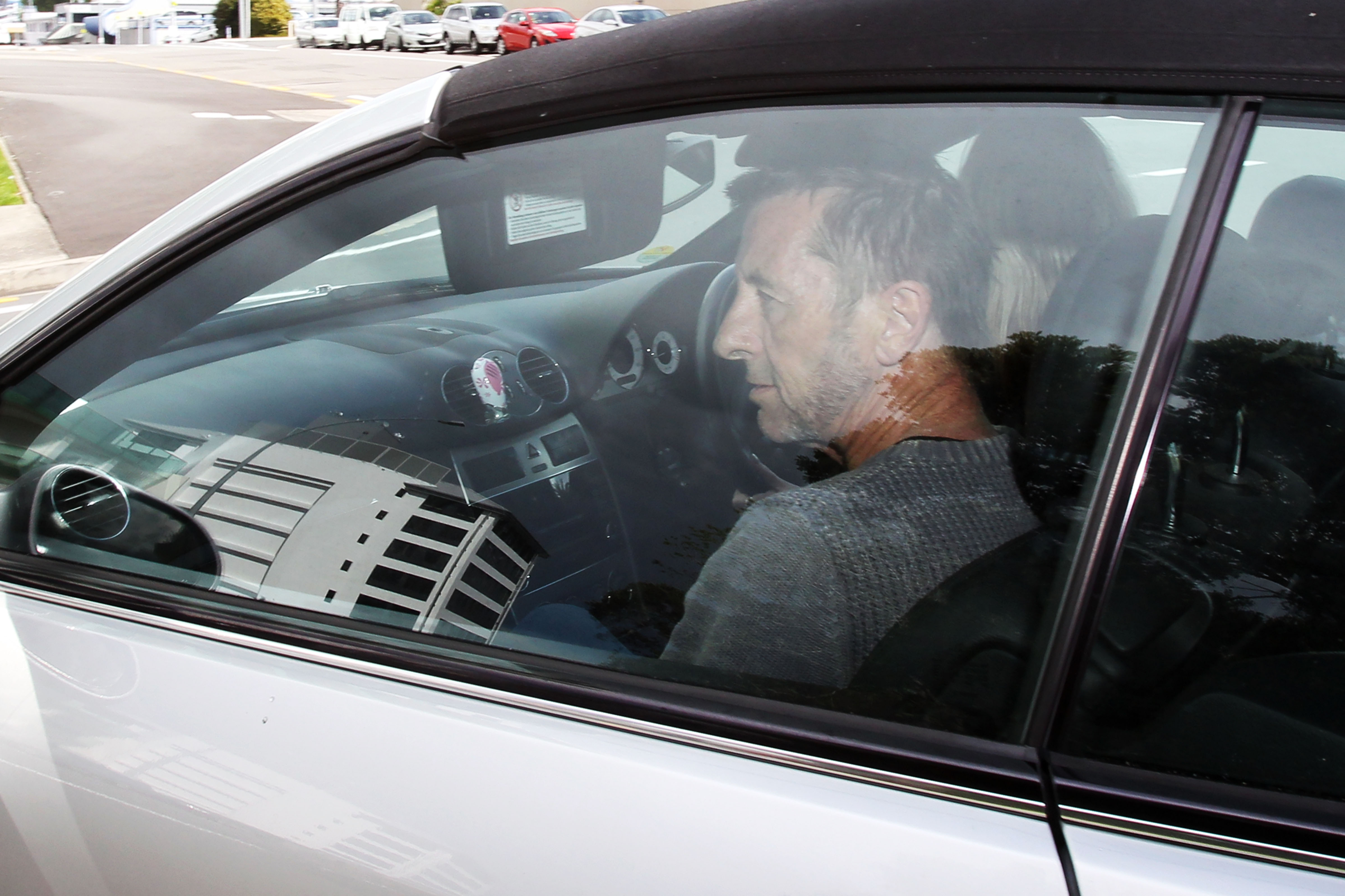 TAURANGA, NEW ZEALAND - NOVEMBER 06:  AC/DC drummer Phil Rudd leaves Tauranga District Court  after being charged with attemp