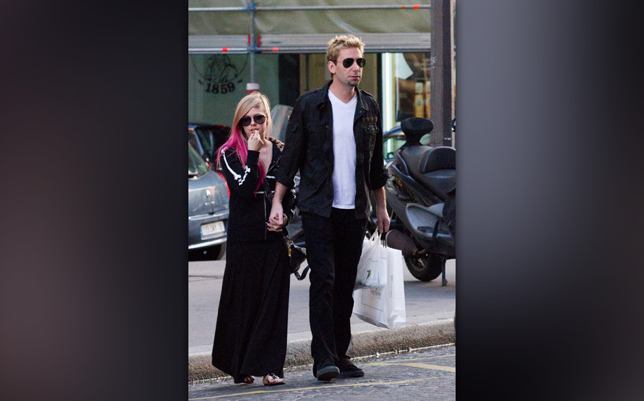 PARIS, FRANCE - SEPTEMBER 13:  Singer Avril Lavigne and Chad Kroeger are seen strolling on September 13, 2012 in Paris, Franc