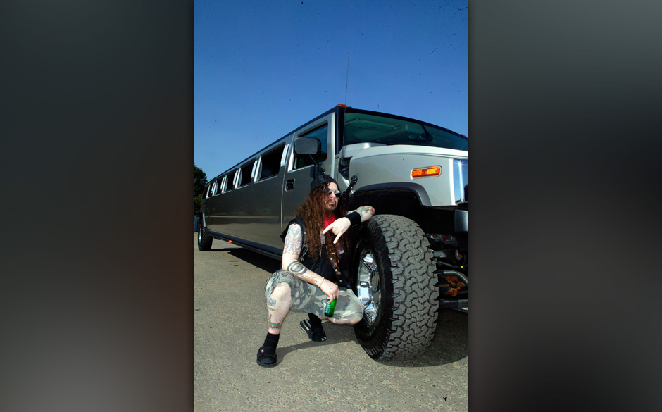 UNITED KINGDOM - JUNE 01:  Photo of Dimebag DARRELL; posed, with stretched Hummer car  (Photo by Mick Hutson/Redferns)