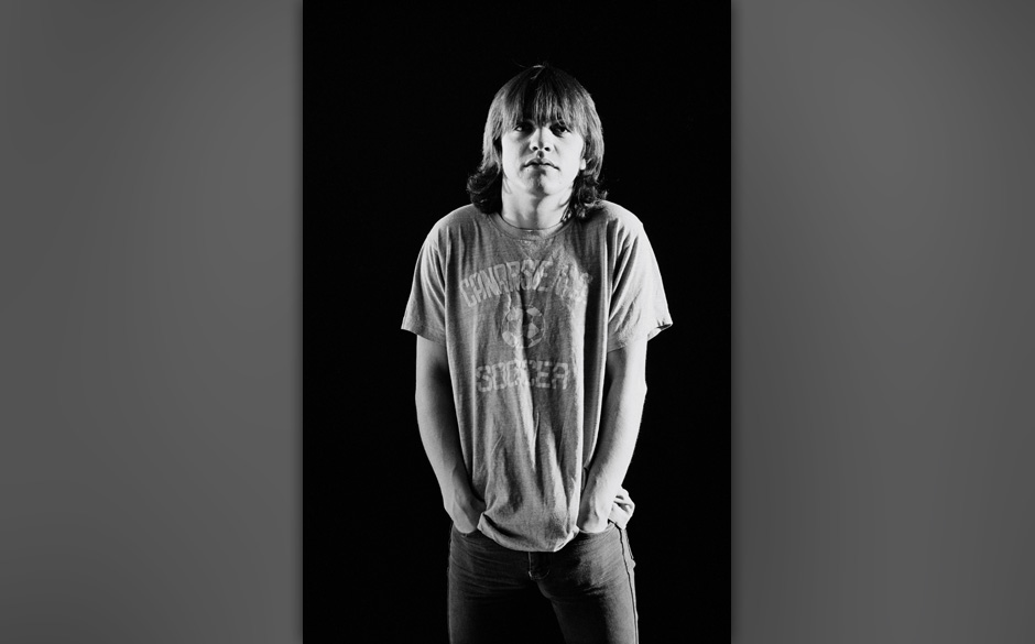 LONDON -  1st AUGUST: Rhythm guitarist Malcolm Young from Australian rock band AC/DC posed in a studio in London in August 19