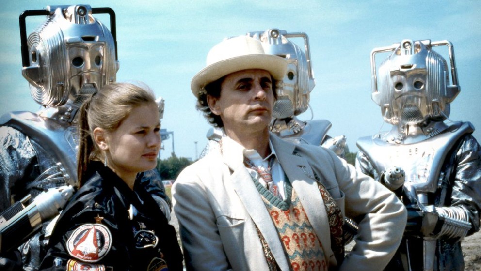 Picture shows: The Doctor (SYLVESTER MCCOY) and Ace (SOPHIE ALDRED) surrounded by CybermenWARNING: This image may only be use