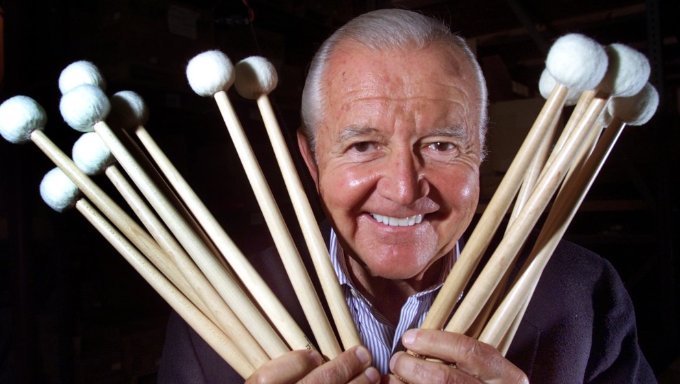 DEDHAM - JUNE 10: Vic Firth, who is retiring from the Boston Symphony Orchestra after 50 years, poses with some of the drumst