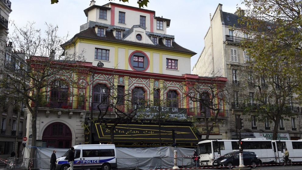 A general view shows the area outside the Bataclan theatre in Paris cordoned off by police on November 18, 2015. Three men we