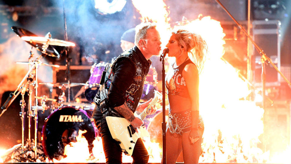 LOS ANGELES, CA - FEBRUARY 12:  Recording artists James Hetfield (L) of music group Metallica and Lady Gaga perform onstage d