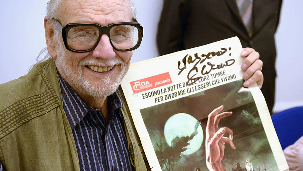 LUCCA, ITALY - APRIL 07:  American film Director, screen writer and editor George Romero signs autographs to his italians fan