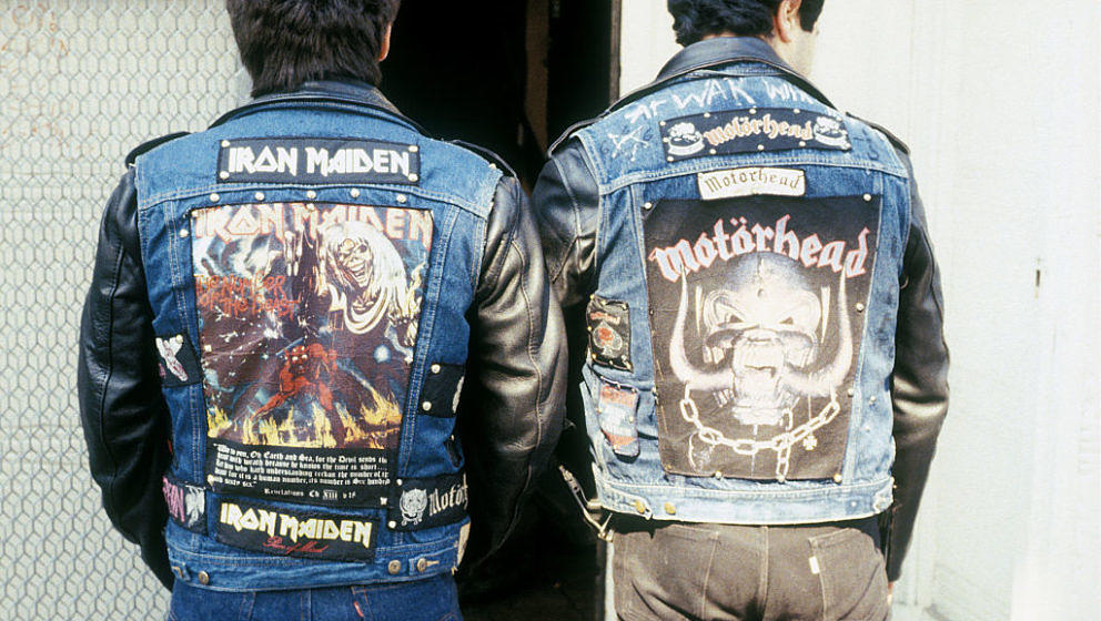 80s Heavy Metal fans wearing Iron Maiden and Motorhead leather jackets, Kings Road, London. 1980's. (Photo by: Paul Hartnett/