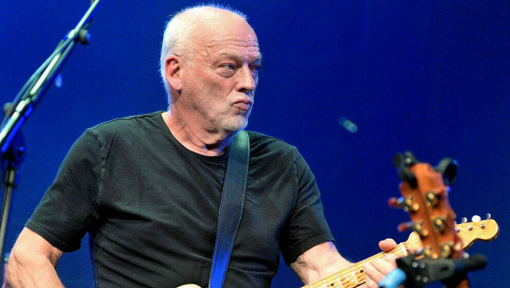 LONDON< ENGLAND - SEPTEMBER 30: David Gilmour joins Richard Thompson on stage at his 70th Birthday Celebration show at the