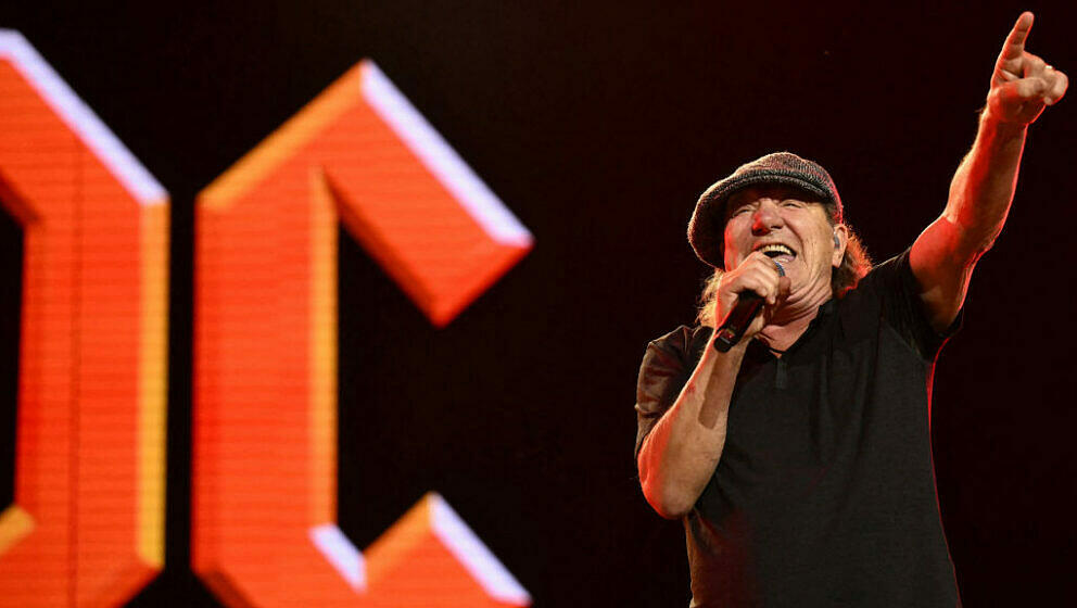 Brian Johnson, lead vocalist of Australian rock band AC/DC performs on stage during their 'PowerUp Tour 2024' at the VELTINS-