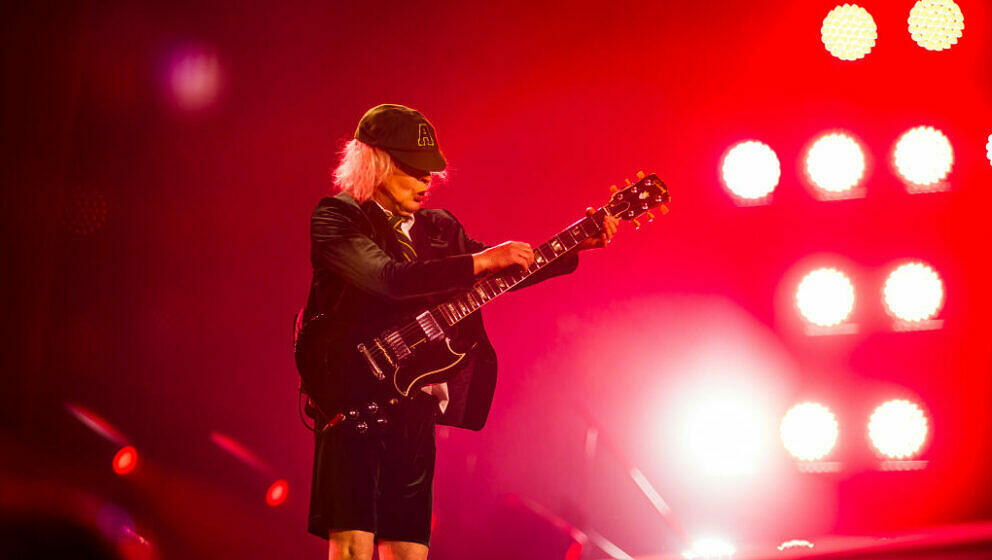 GELSENKIRCHEN, GERMANY - MAY 17: Guitarist Angus Young of the band AC/DC perform live on stage during a concert at Arena AufS