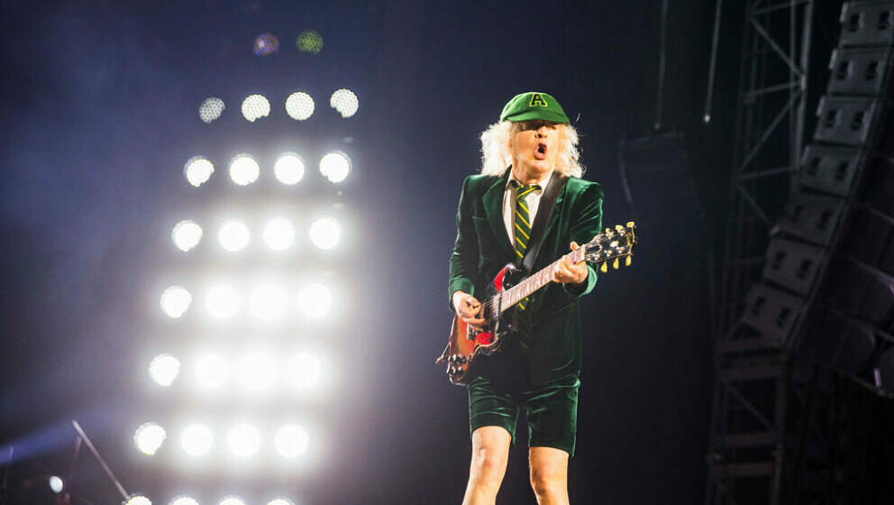 GELSENKIRCHEN, GERMANY - MAY 17: Guitarist Angus Young of the band AC/DC perform live on stage during a concert at Arena AufS