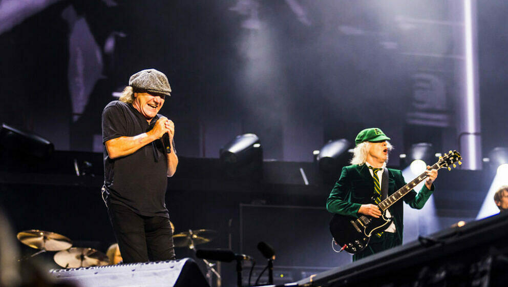 GELSENKIRCHEN, GERMANY - MAY 17: Singer Brian Johnson and Angus Young of the band AC/DC perform live on stage during a concer