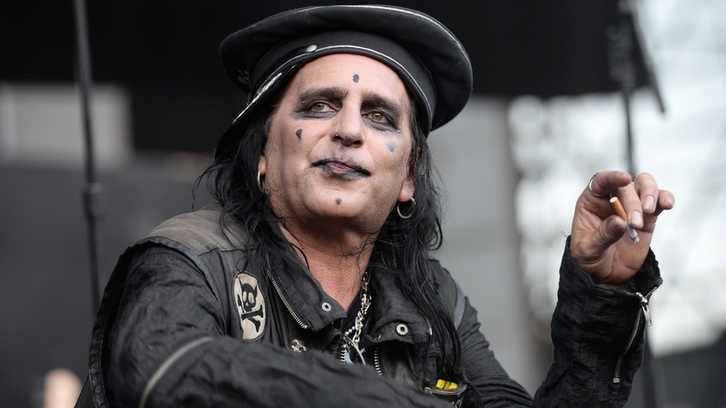 IRVINE, CA - AUGUST 15:  Singer Taime Downe of Faster Pussycat performs onstage at Irvine Meadows Amphitheatre on August 15, 